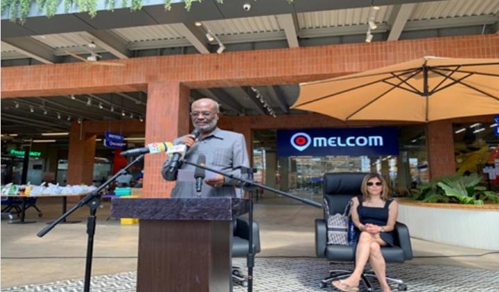 Melcom celebrates late Founder; Supports Flood Victims in V/R
