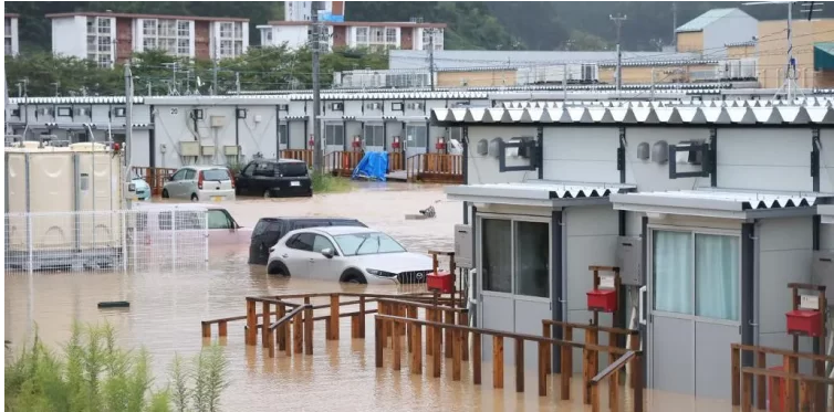 Six dead after record rain causes floods in Japan